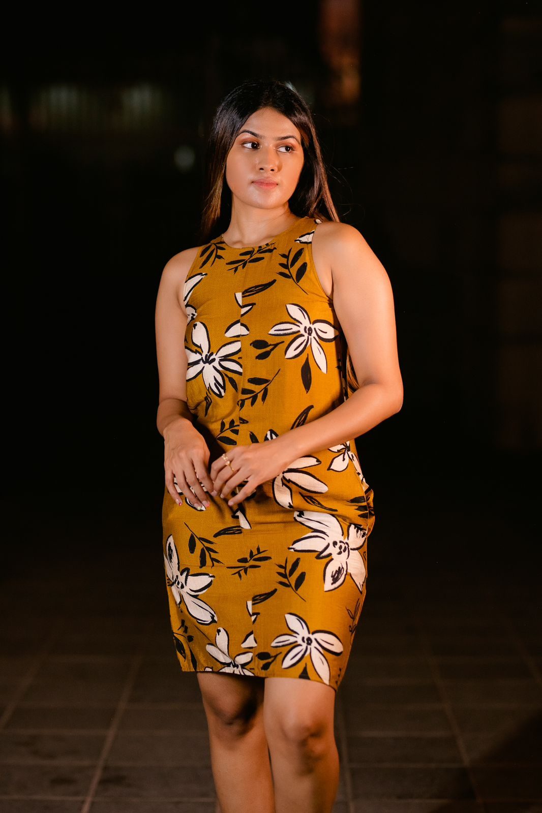 Printed arm-cut dress for girls, designed for a trendy, youthful look perfect for casual outings and summer days.